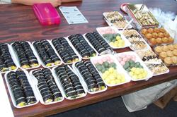 Korean sushi and other goodies, free for the sampling.