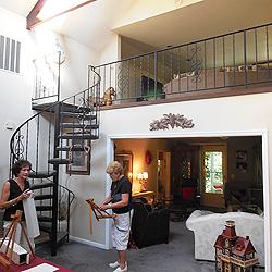 …until you're inside. Spiral staircase leads from living room to what was once the hayloft.