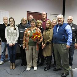 Part of the program was given over to the Society's Annual General Meeting. Here, LHS officers honor outgoing President Becky Huber (center).
